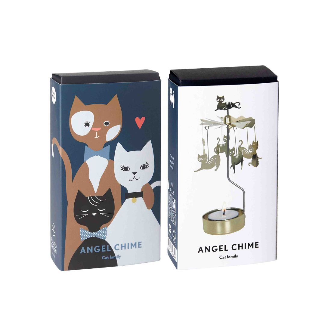 Two boxed Angel Chime Cat Family items. One box shows illustrated cats; the other shows a metal cat-shaped candle warmer.