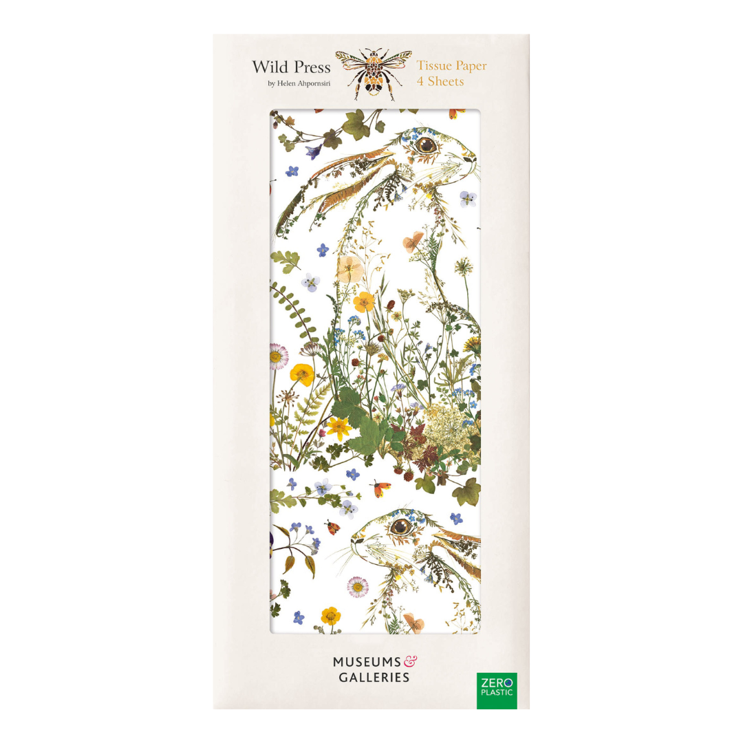 Four sheets of tissue paper featuring pressed wildflowers and hares. Wild Press design by Helen Ahpornsiri.