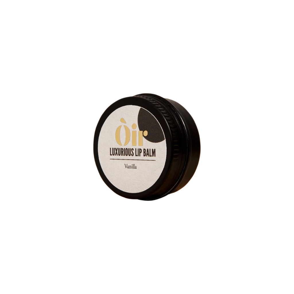 Lip balm container with 'Oii' branding on a white background