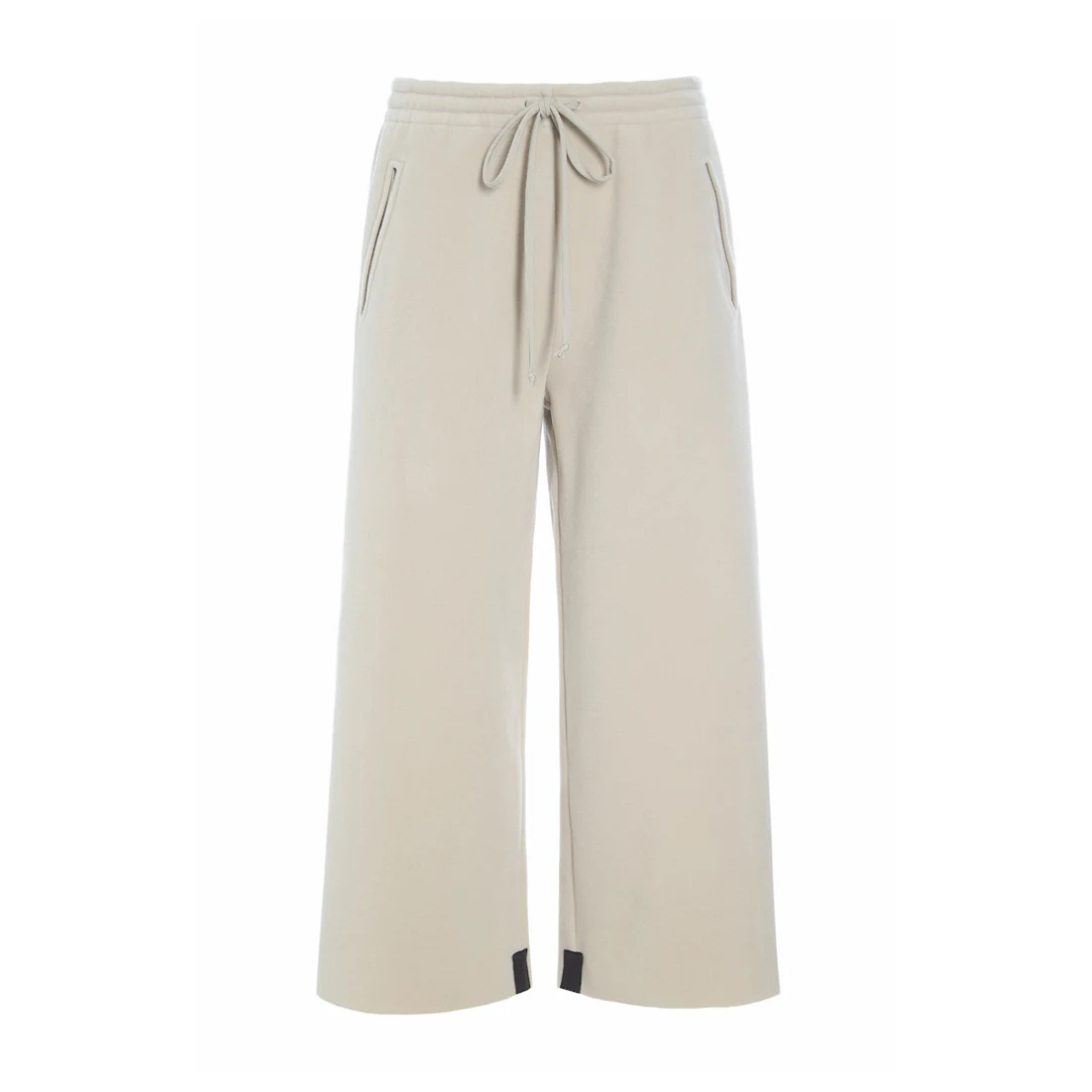 Beige wide-leg pants with drawstring waist on a white background