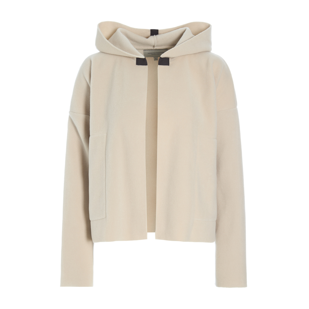 Simple Cream cardigan on white background 
