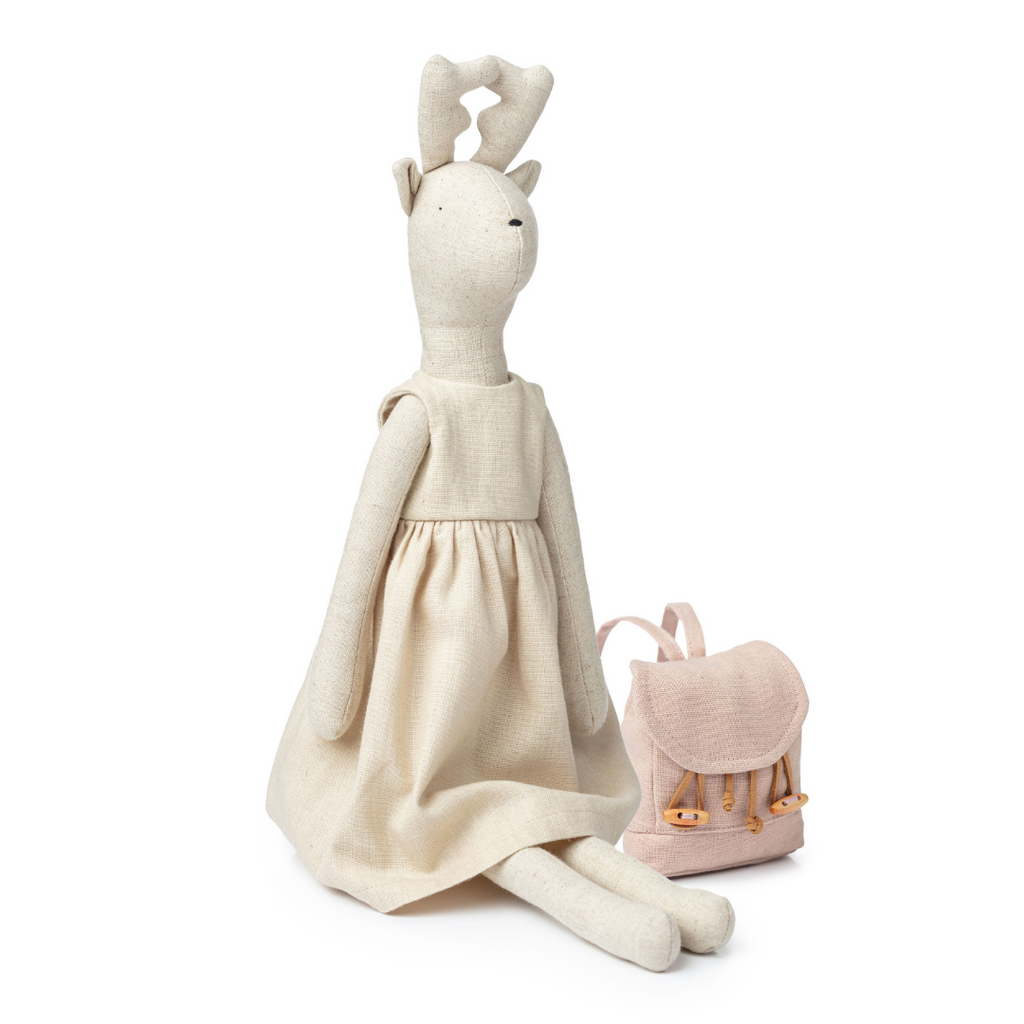 Stuffed animal toy with a dress and backpack on a white background