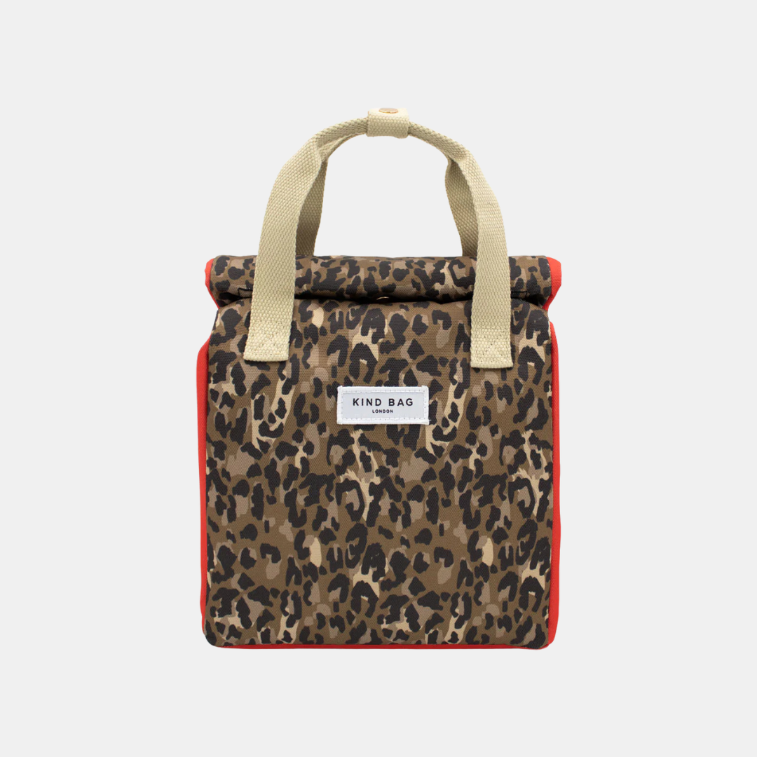 Leopard print bag with beige handle on a white background