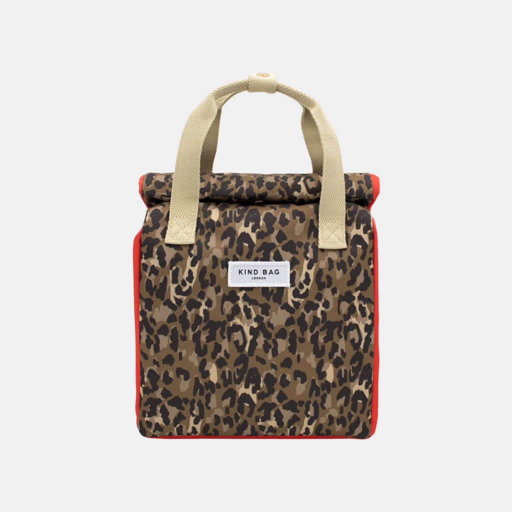 Leopard print bag with beige handle on a white background