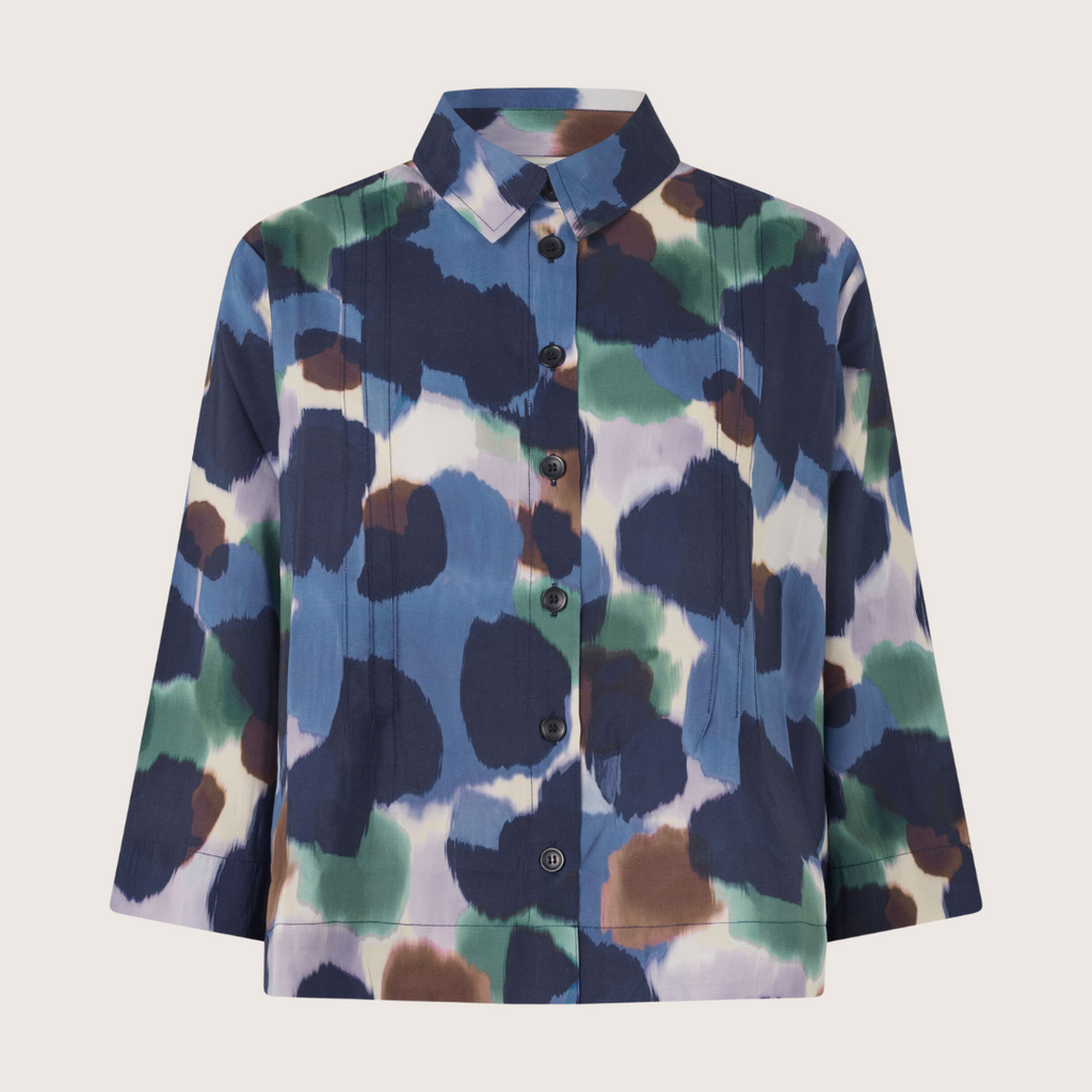 Abstract print button-down shirt with three-quarter sleeves.  Blues, greens, and browns dominate the design.