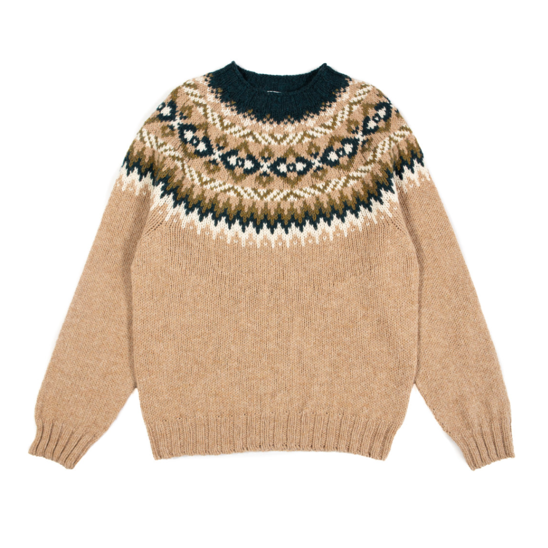 Beige sweater with patterned neckline on a white background