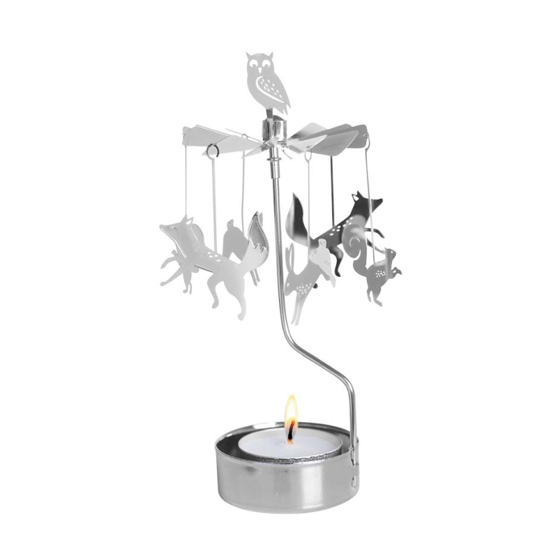 Metallic candle holder with hanging animal figures on a white background