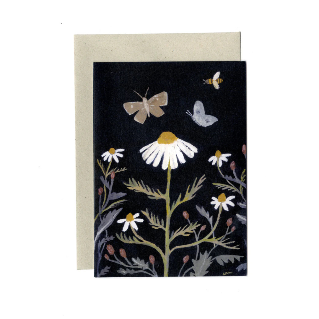 Greeting card with floral design featuring a daisy, butterflies, and bees on a dark background.
