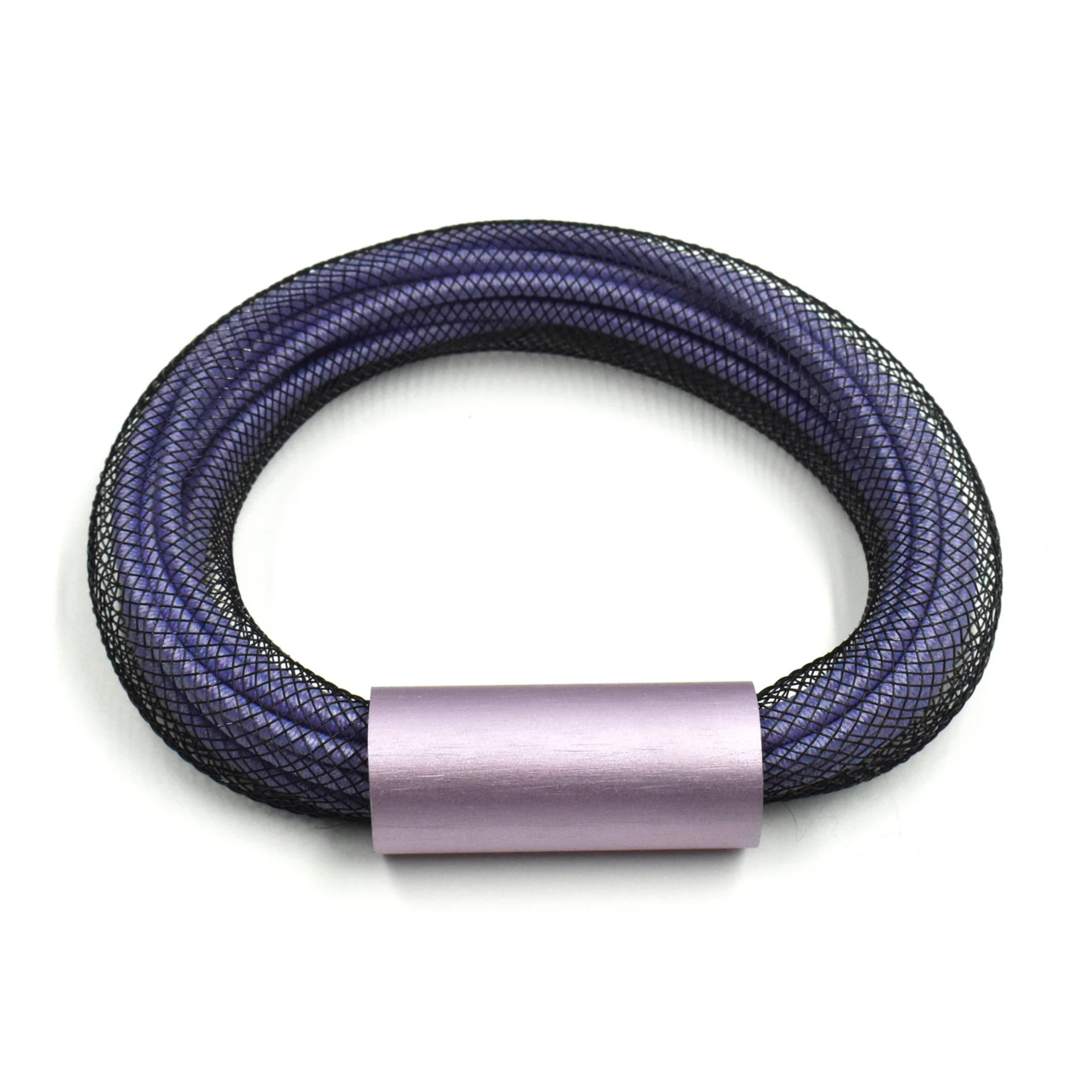 A braided mesh bracelet in a dark purple and black color combination, featuring a smooth, cylindrical metallic clasp in a light lavender-purple finish, shown on a plain white background.