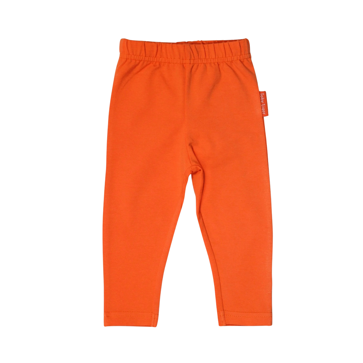 Bright orange children's sweatpants with an elastic waistband, shown flat against a white background. A small red brand tag is visible on the right side seam.