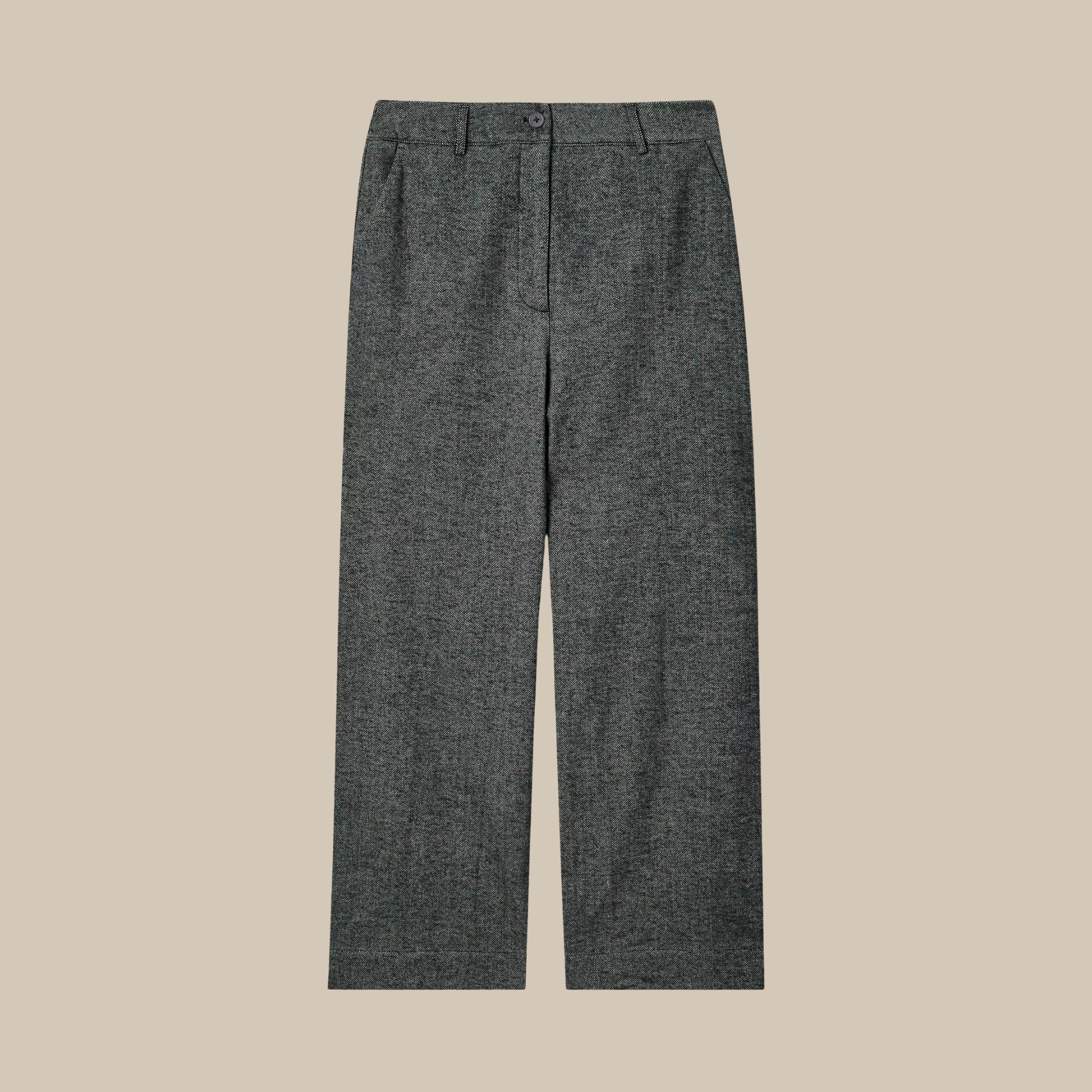 A pair of dark gray textured wool trousers shown flat against a solid beige background.