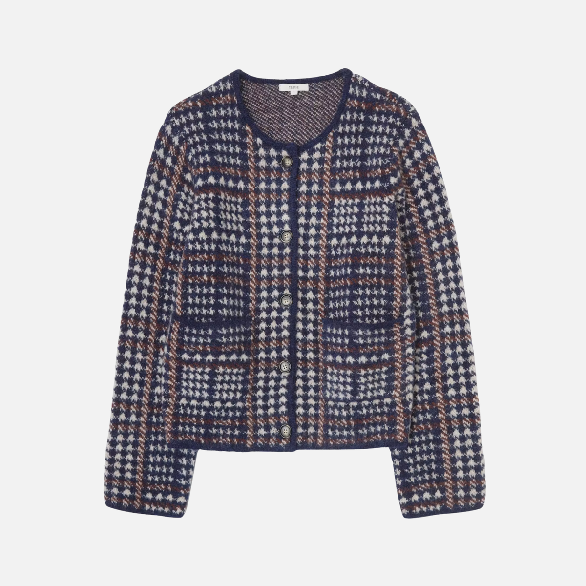 A cropped knit cardigan featuring a complex geometric pattern in navy blue, white, and rust brown, with a button-up front and long sleeves, shown against a light gray background.