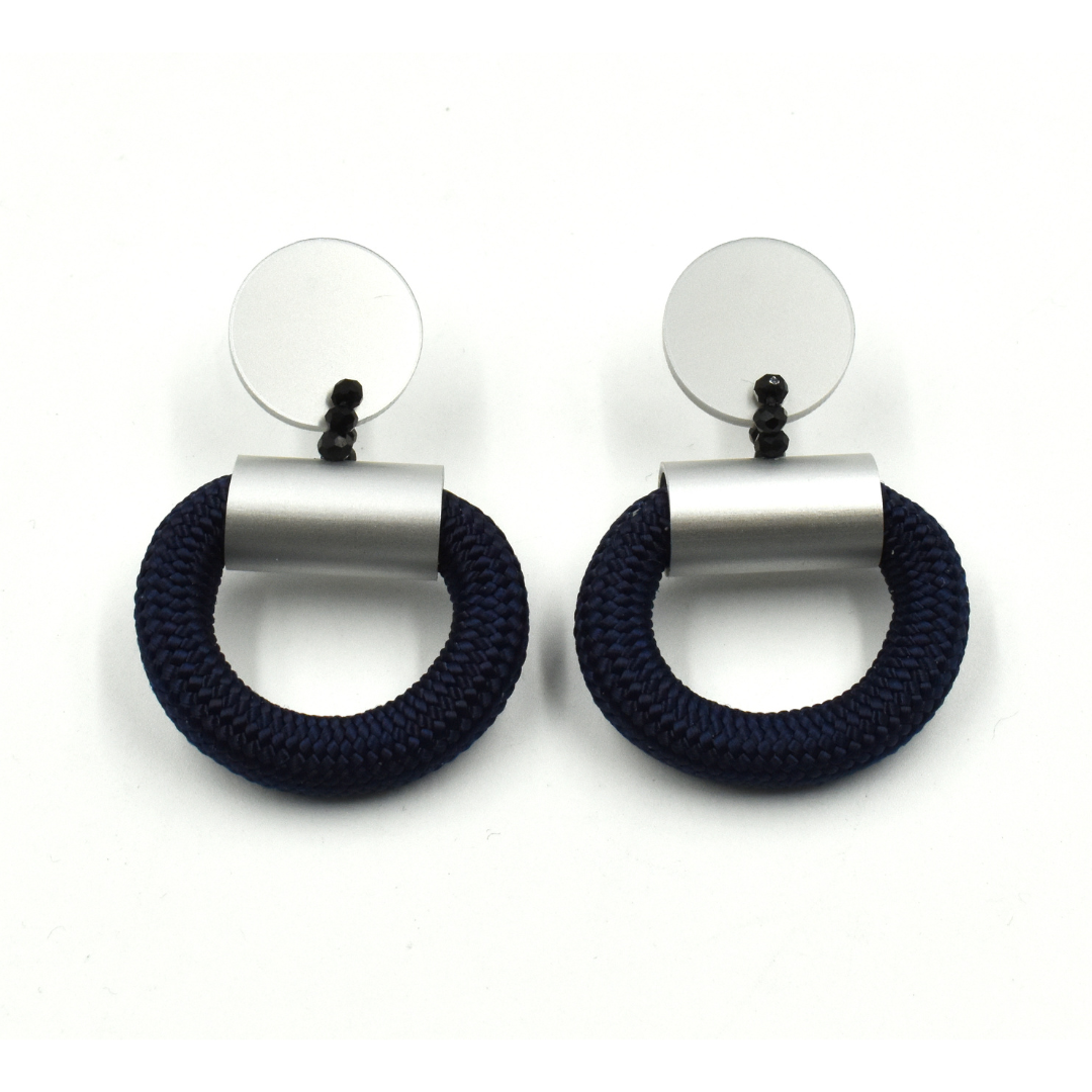 Pair of navy rope and silver hoop earrings.