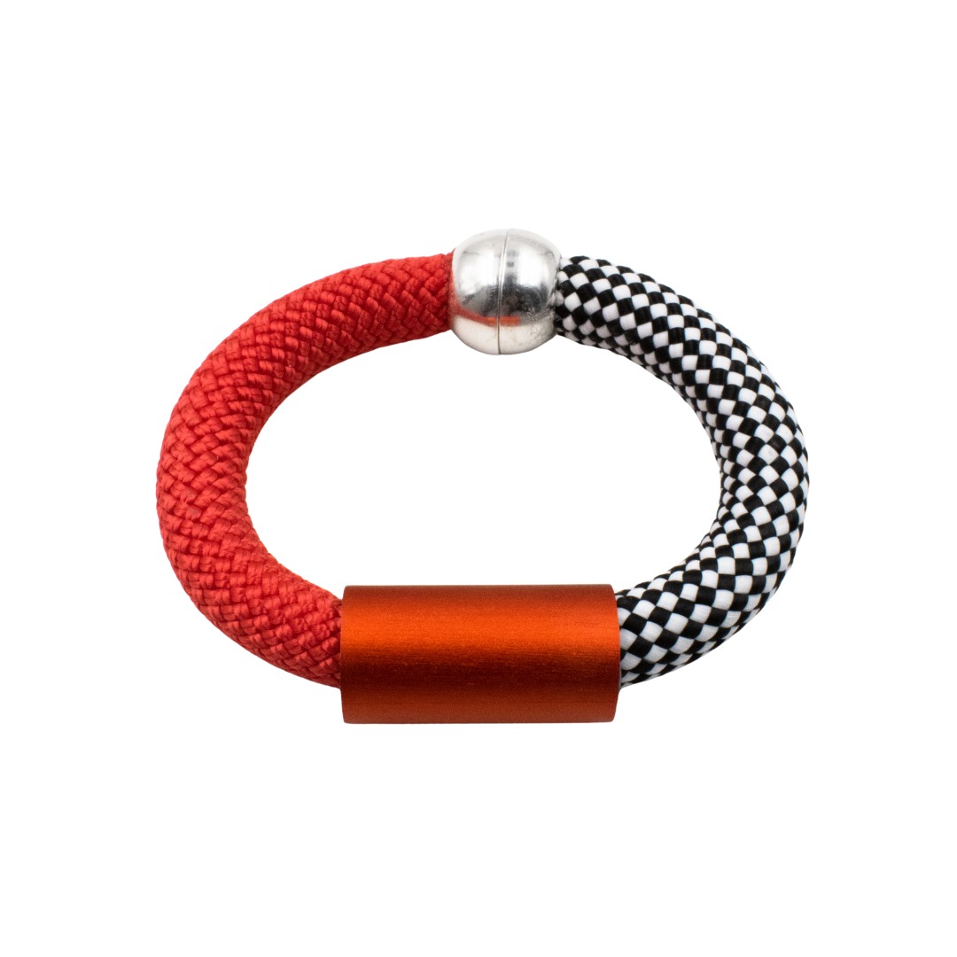 Red and black rope bracelet with metallic accents.  Features a cylindrical and spherical metal bead.