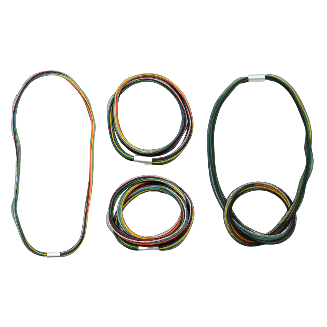 Three multicolored braided cord necklaces; one long, one shorter, and one knotted.