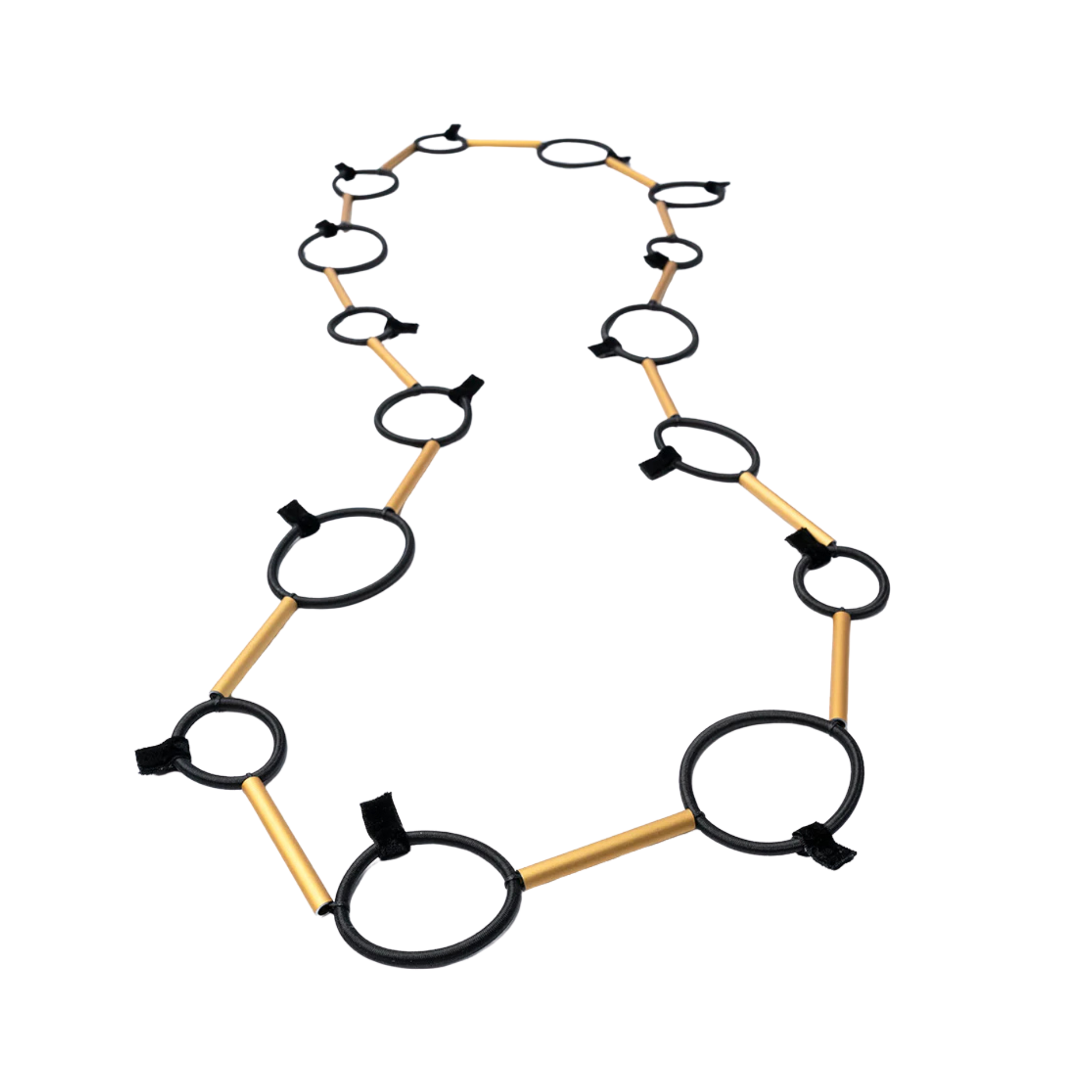 A black and gold chain-link necklace with circular links and small black tags, displayed on a solid white background.