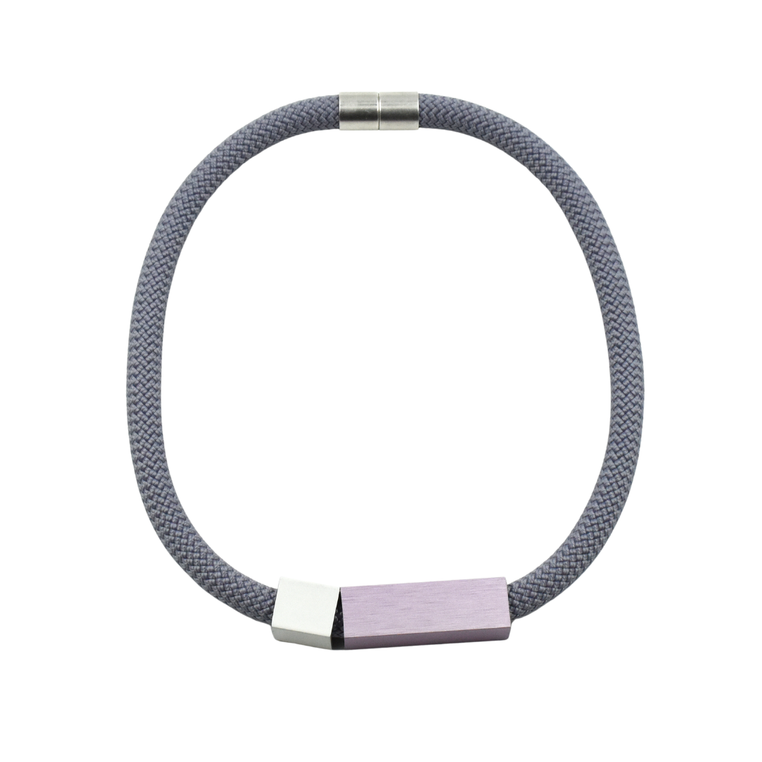 Gray rope necklace with silver clasp and rectangular lilac and silver accents.