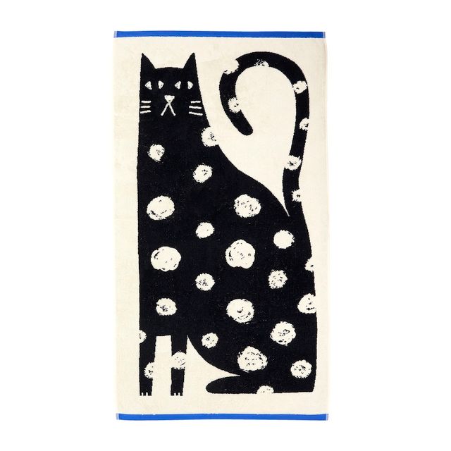 Towel with a black cat design on a white background