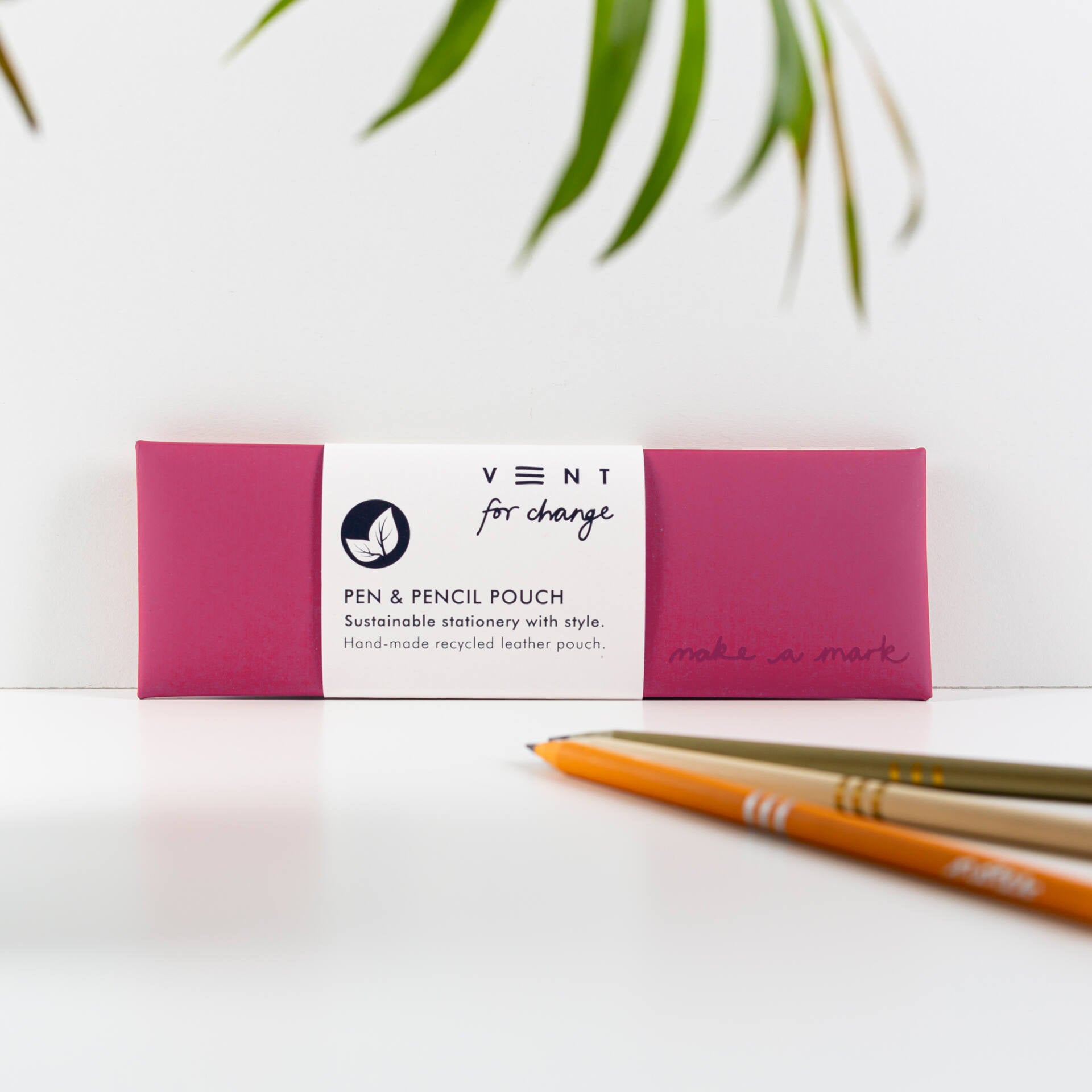 Crimson recycled leather pen and pencil pouch; sustainable stationery; "Vent for change" branding.