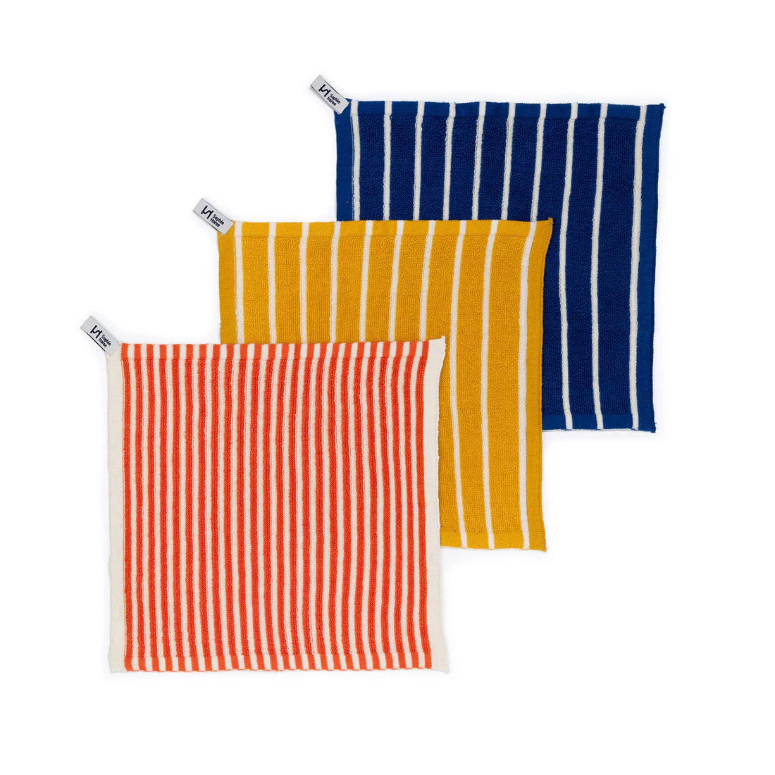 Three striped towels in blue, yellow, and red on a white background