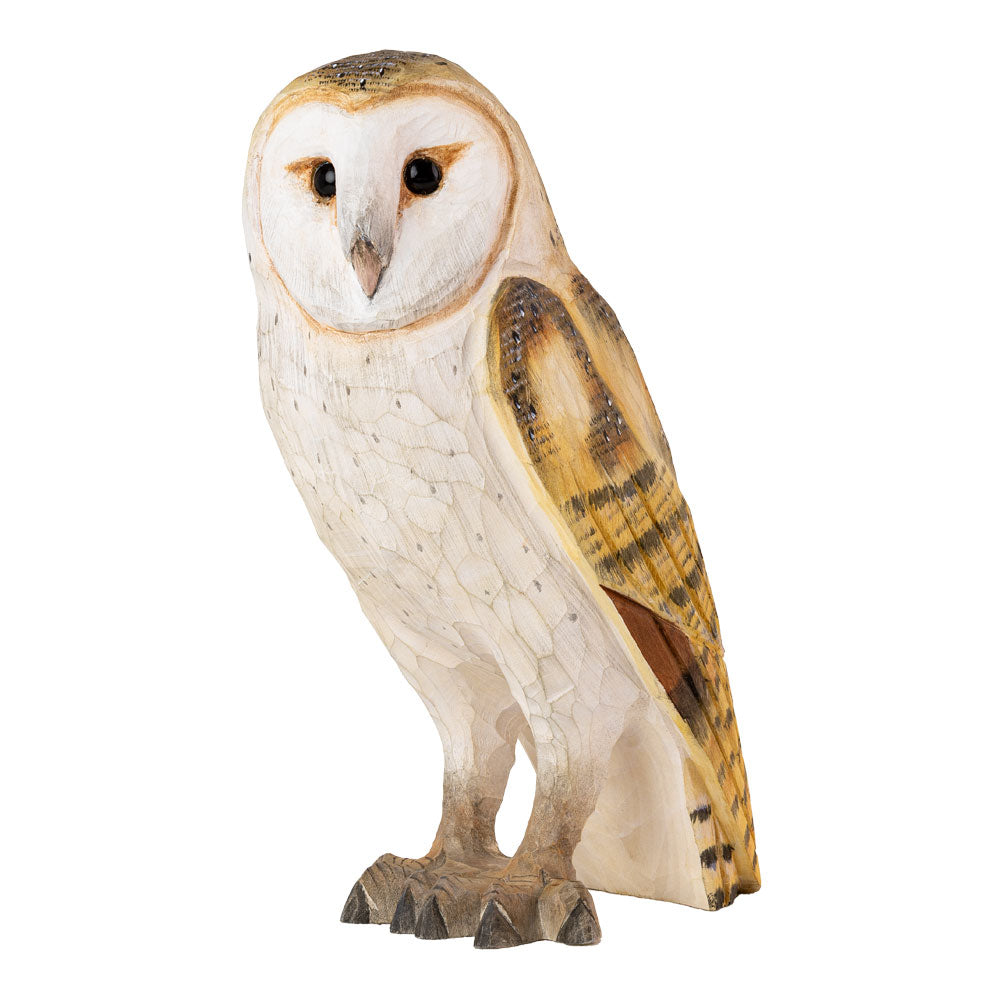 Resin model of an owl on a white background