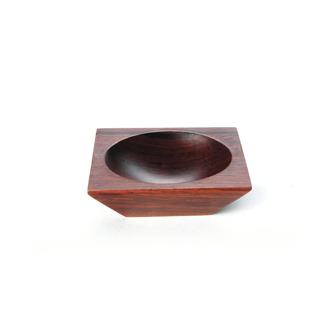 Small, dark brown wooden bowl with a square base and a rounded interior.