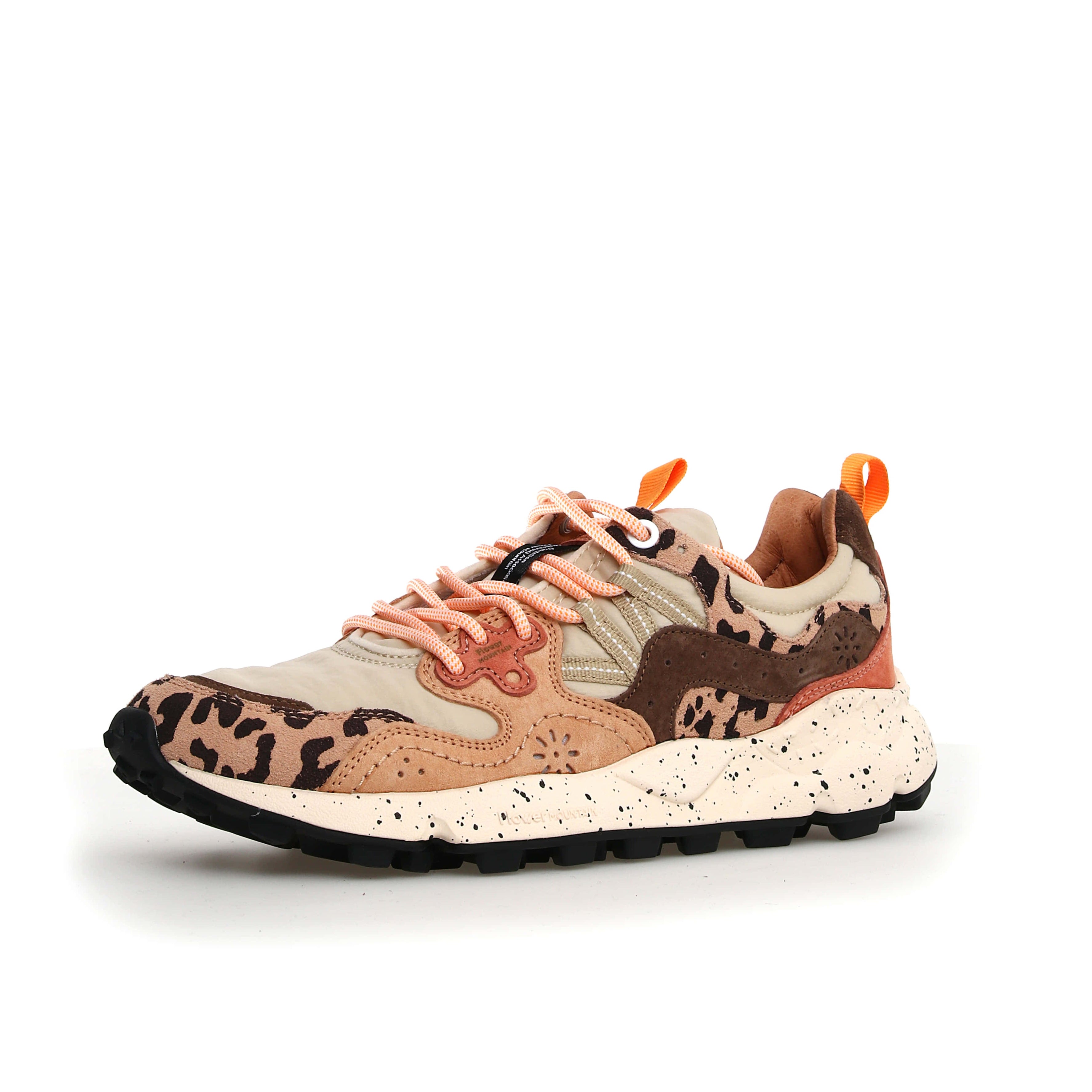 Beige and brown leopard-print low-top sneaker with orange laces and a chunky, speckled sole.