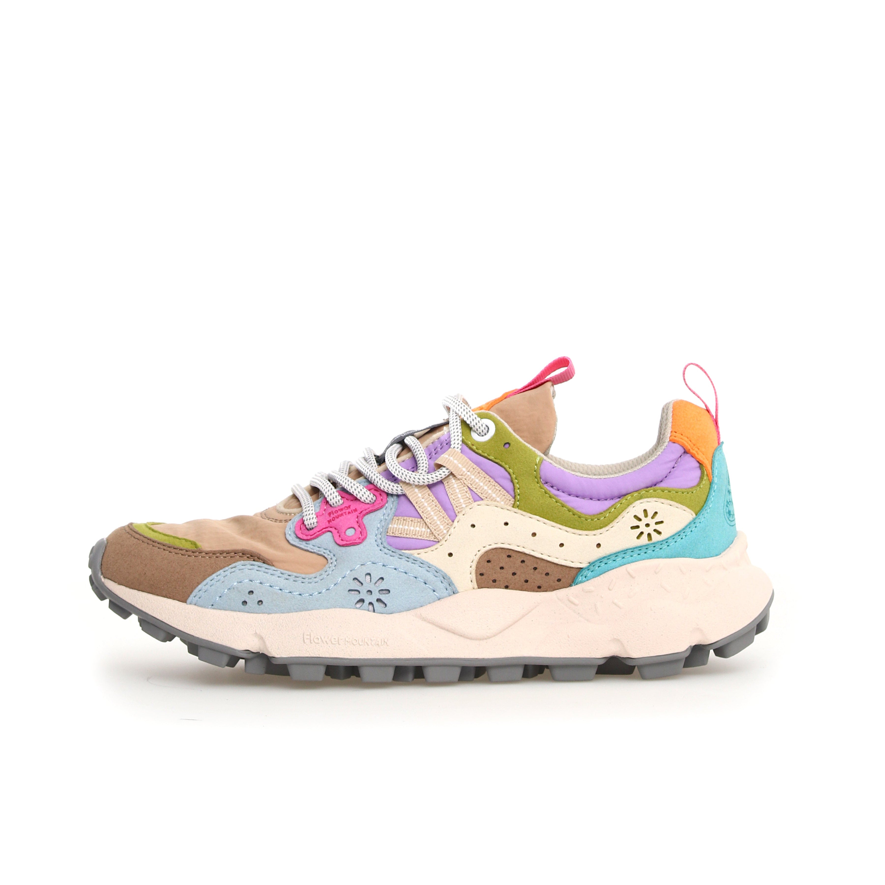 Multicolored low-top sneaker with a chunky sole, featuring suede and textile upper in shades of brown, blue, purple, and