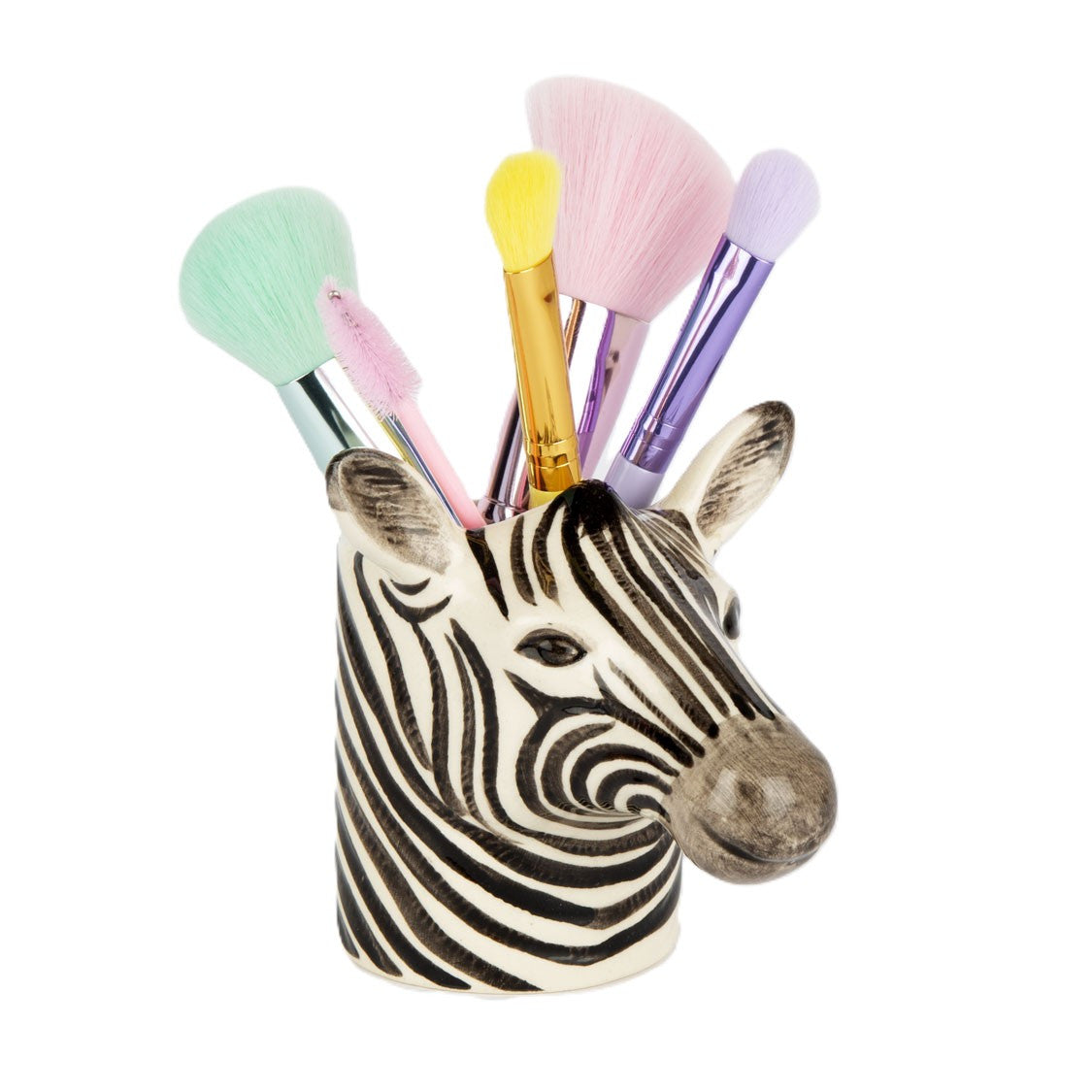 Zebra-shaped makeup brush holder with colorful brushes on a white background