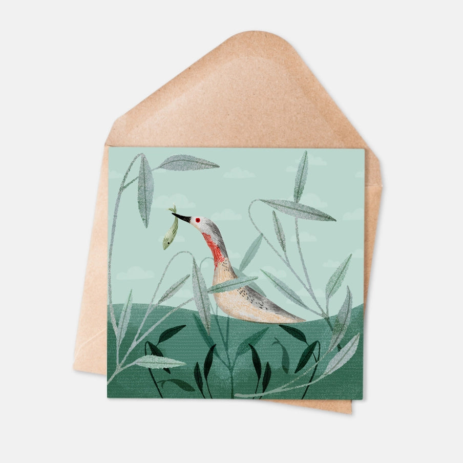Greeting card illustration: A bird with a red breast, standing in reeds, holding a small fish in its beak.