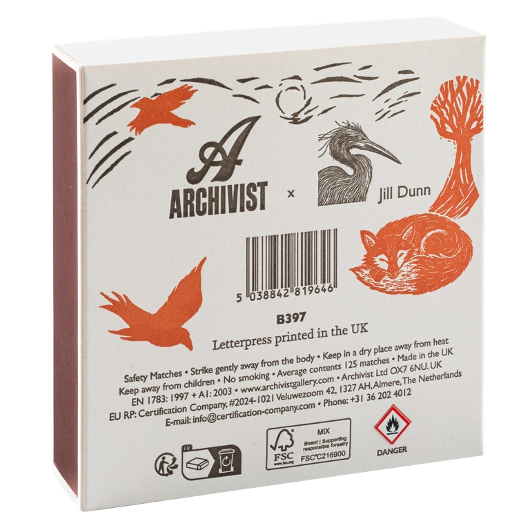 Back of an Archivist x Jill Dunn letterpress printed matchbox package, showing a white box with black text, barcode, and orange-red illustrated birds and foxes.