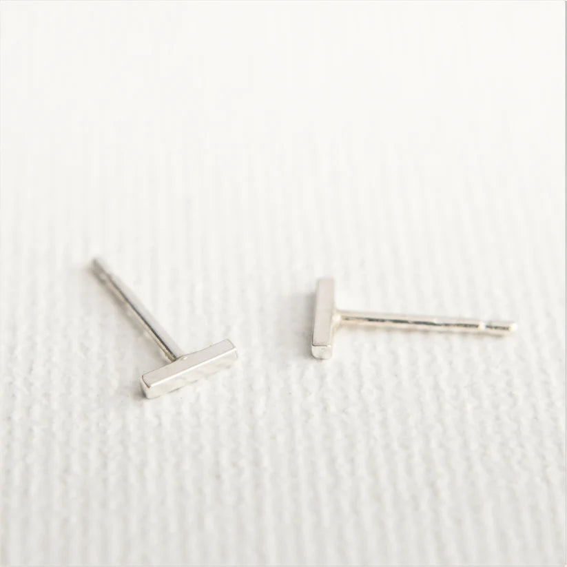 Pair of silver bar stud earrings.  Simple, minimalist design.