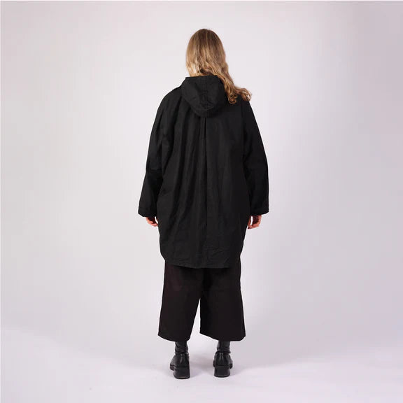 Black hooded oversized coat with a relaxed fit and a slightly A-line silhouette.