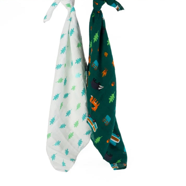 Two baby swaddle blankets with animal patterns hanging on a wooden rod.