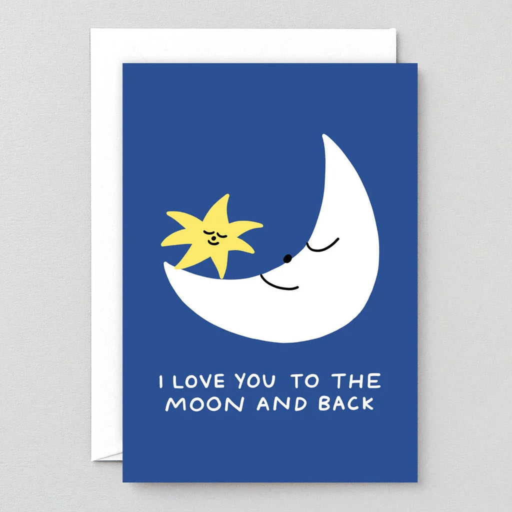 Greeting card featuring a crescent moon and star with faces, on a blue background.