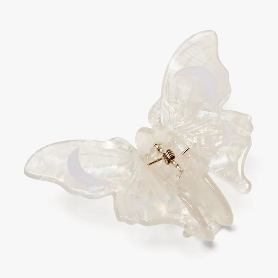 A translucent white butterfly-shaped hair claw clip with a silver-tone metal spring clasp, shown on a clean white background.
