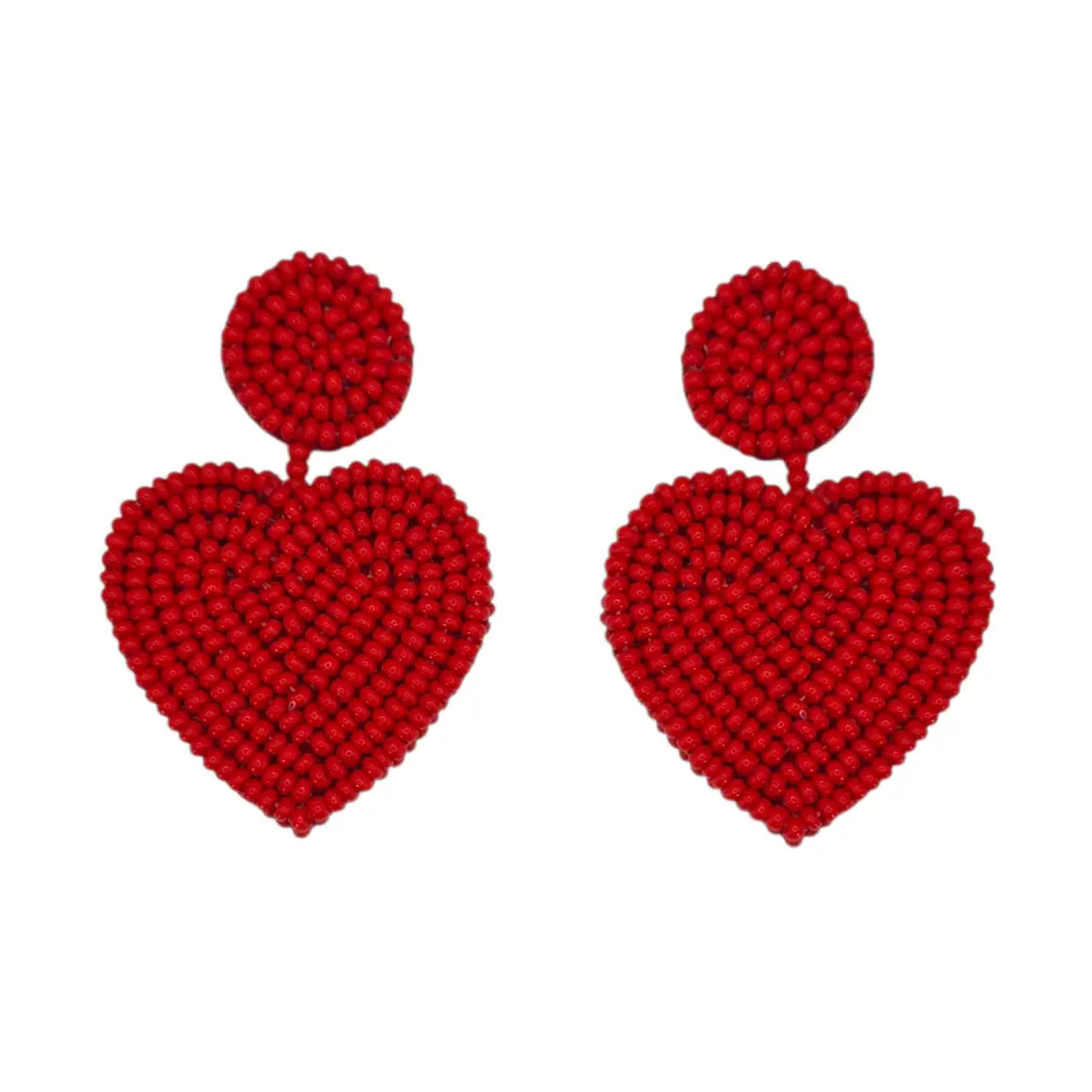 A pair of red beaded drop earrings, each featuring a small round bead top and a larger heart-shaped drop made of tightly woven or beaded red hearts, shown against a plain white background.
