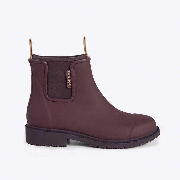 Burgundy rubber ankle boots with a flat sole and a small brand logo on the side.