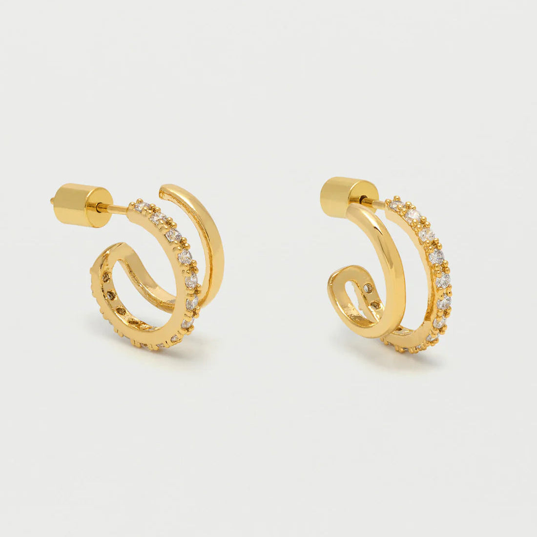 Gold double hoop earrings with clear cubic zirconia accents.