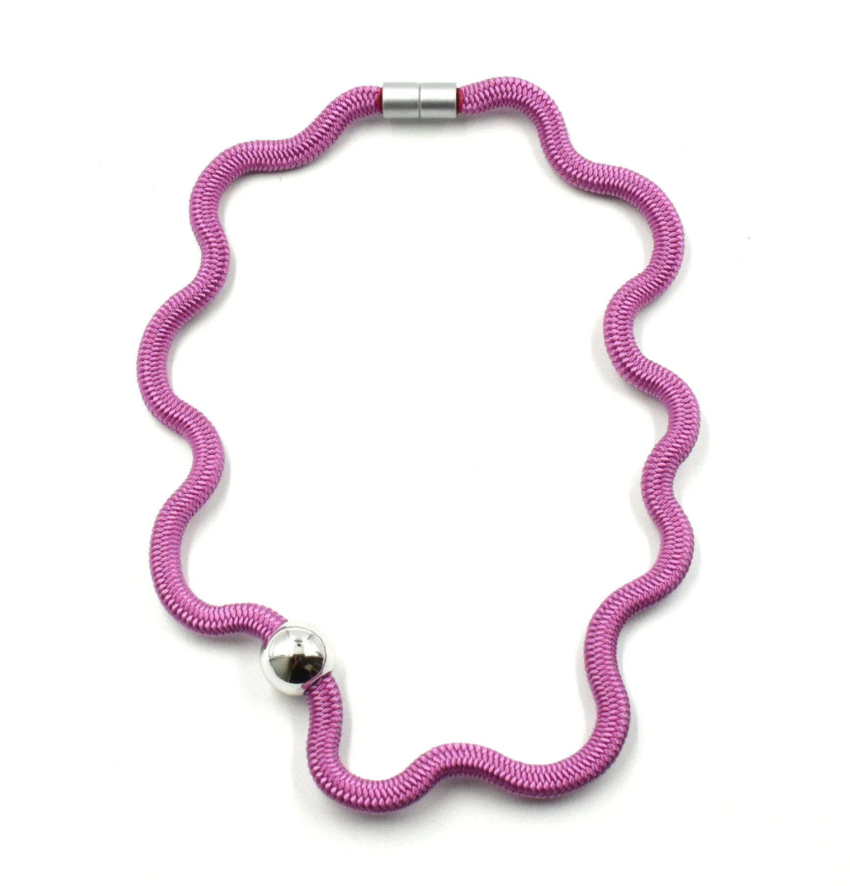A pink wavy snake chain necklace with a silver ball accent bead and a silver magnetic clasp, shown on a plain white background.