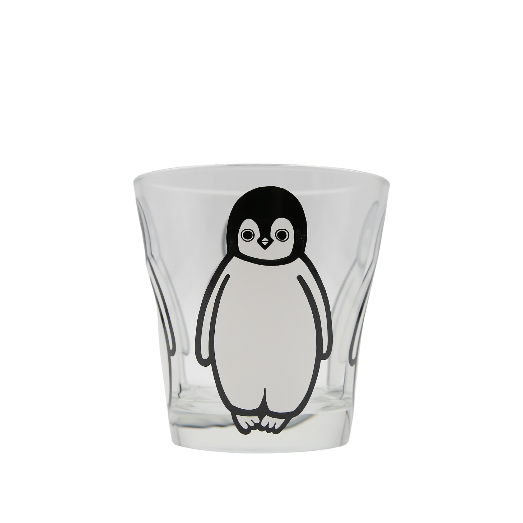 Clear glass tumbler featuring a black and white penguin design.