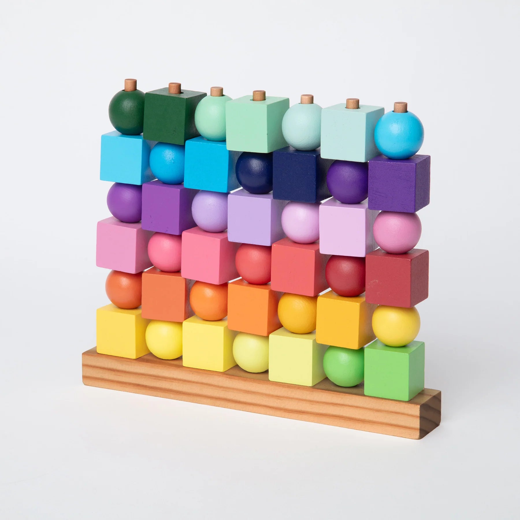 Colorful geometric block and sphere structure on a white background