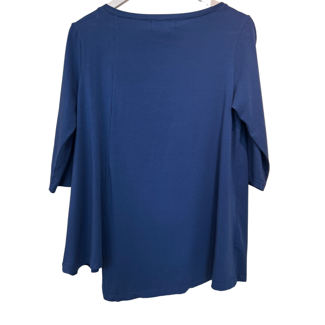 Solid blue, three-quarter sleeve tunic top with a slightly A-line shape and a boat neck.