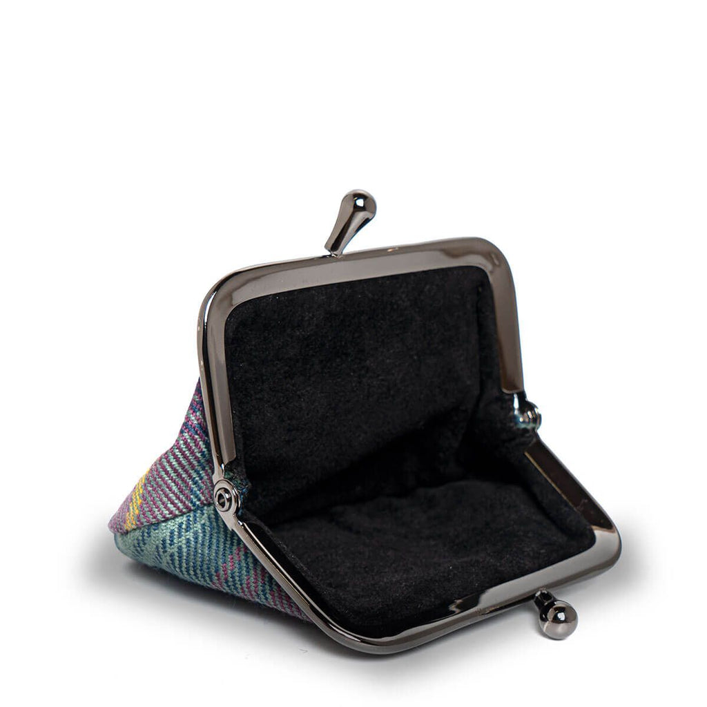 Open triangular purse with a dark gray plaid exterior and a dark gray fabric interior. The frame is gunmetal gray.