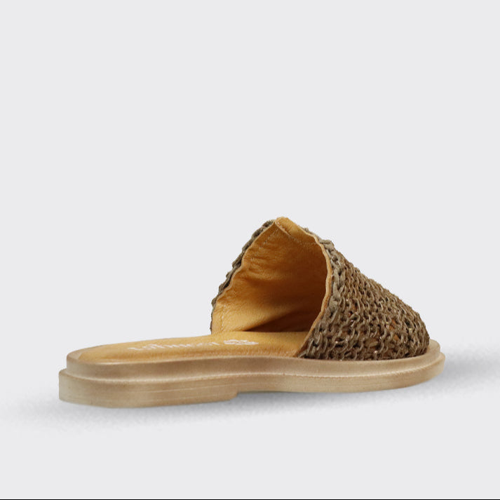 Tan woven slide sandal with a light beige sole.
