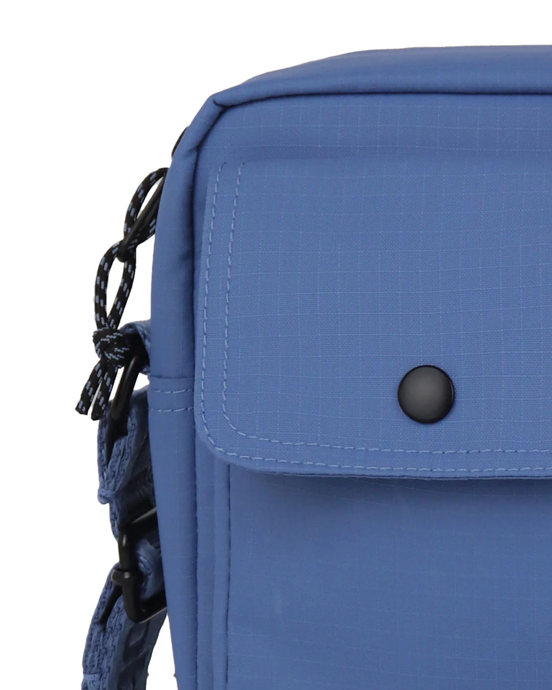 Blue shoulder bag with a front flap pocket and adjustable strap.