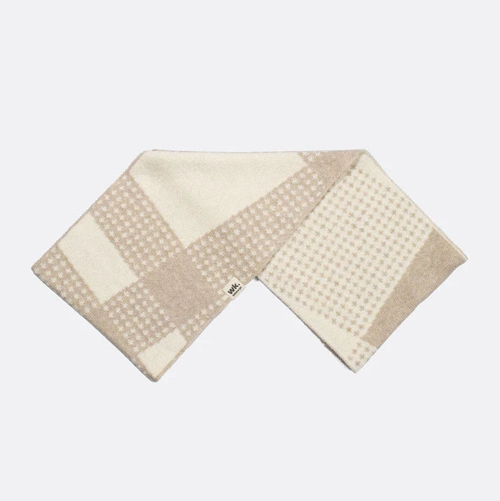 Cream and beige knitted cowl neck scarf with an abstract geometric pattern.