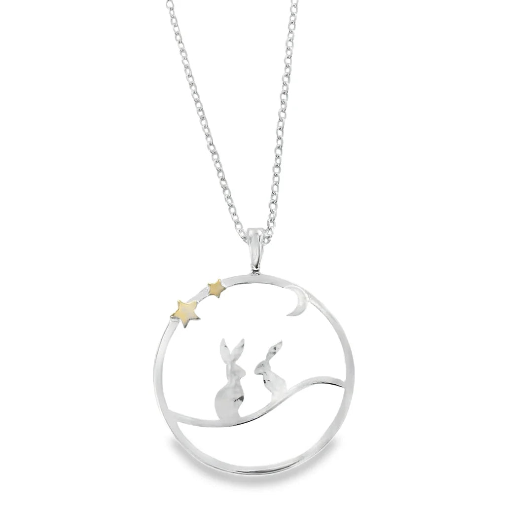 silver necklace featuring a design of hares stars and moon 