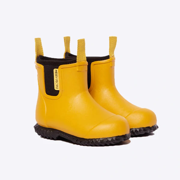 Pair of mustard-yellow children's rain boots with black soles and a black fabric detail on the back.