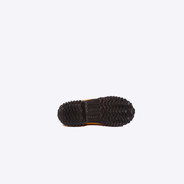Yellow rubber boot sole with a black, textured tread.